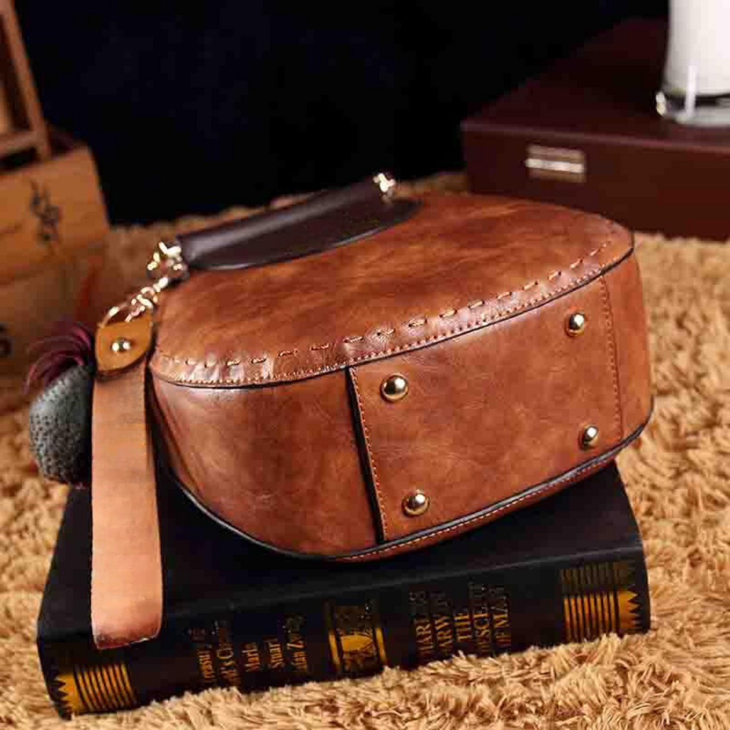 Women's Retro Handbag with Braided Handles and Charm