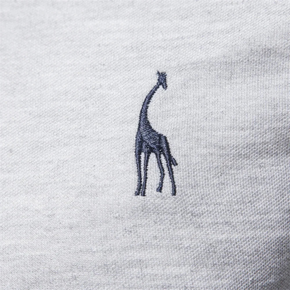Women's cotton button-front collared blouse with giraffe embroidery