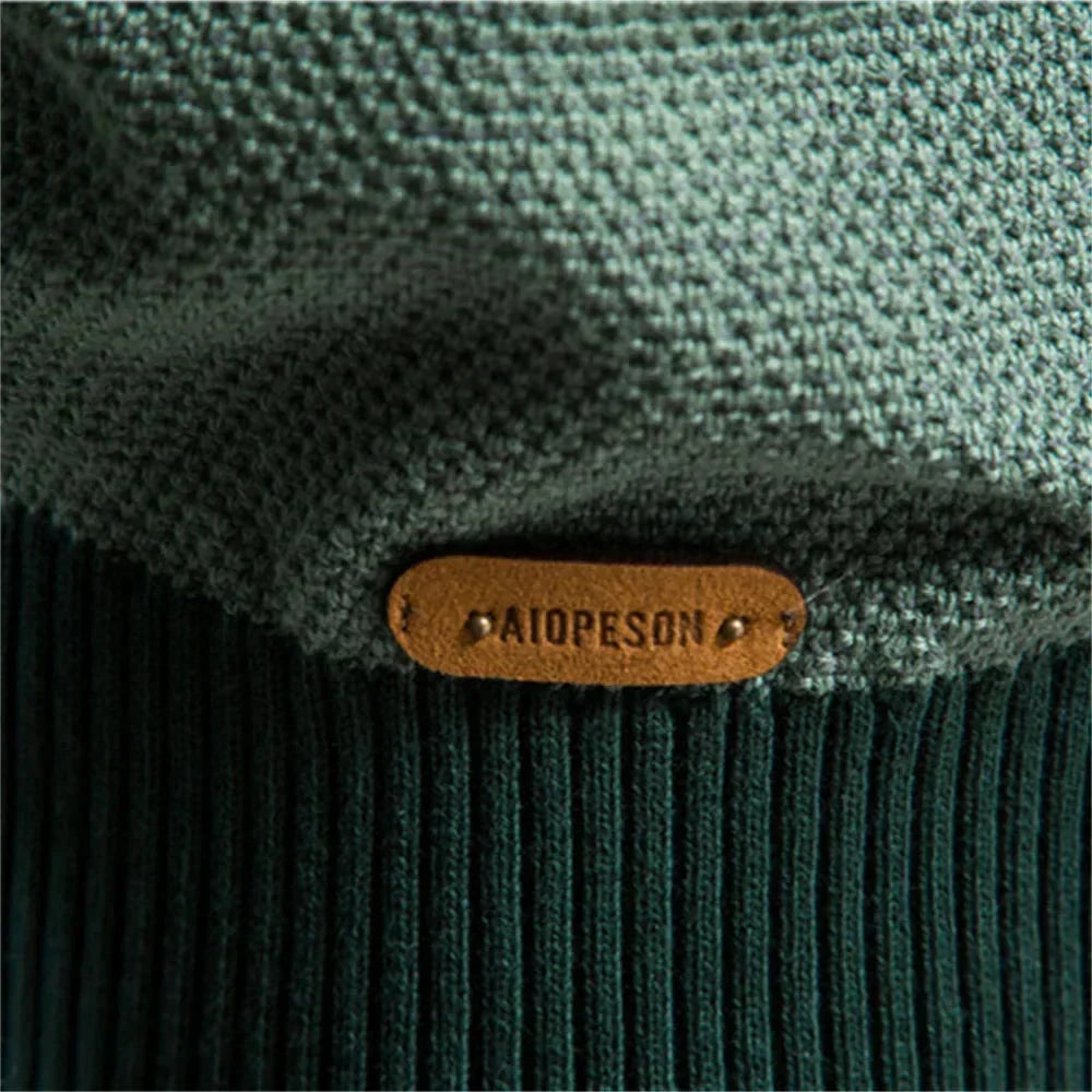 Women's striped knit crew neck sweater with chest emblem