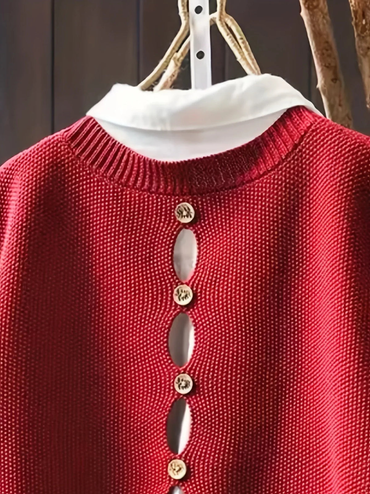 Women's knit crew neck sweater with button-back detail