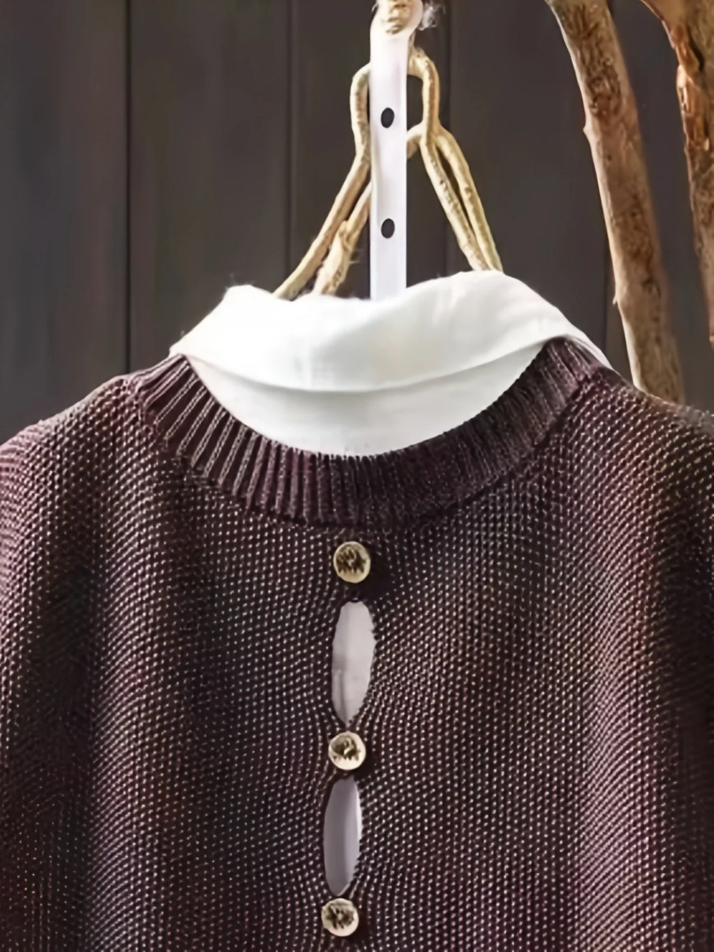 Women's knit crew neck sweater with button-back detail