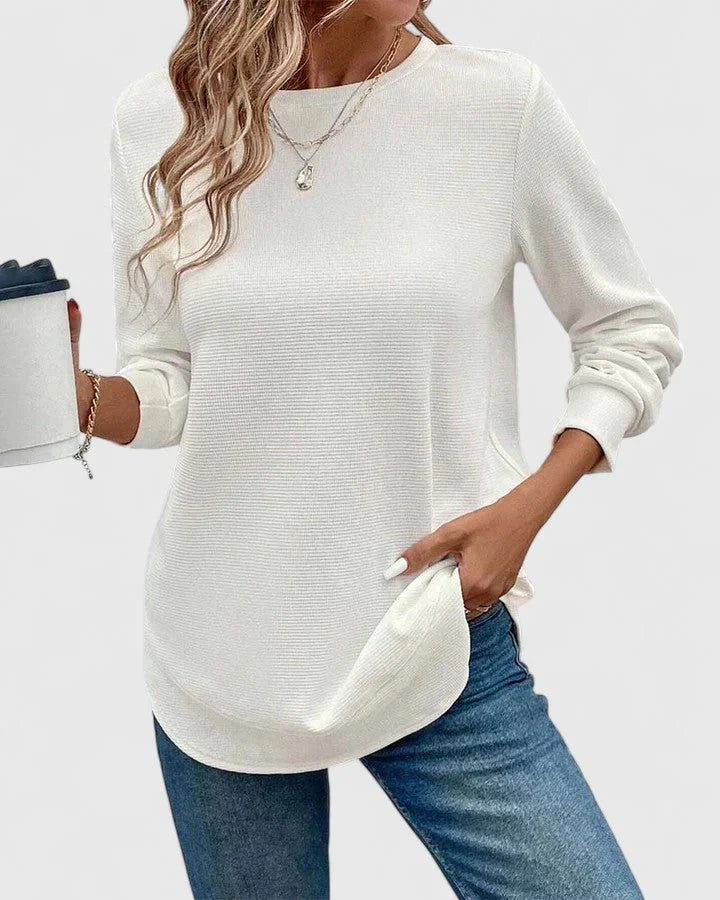 Women's knit crew neck sweater with curved hem