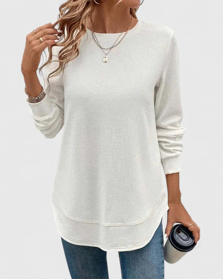 Women's knit crew neck sweater with curved hem