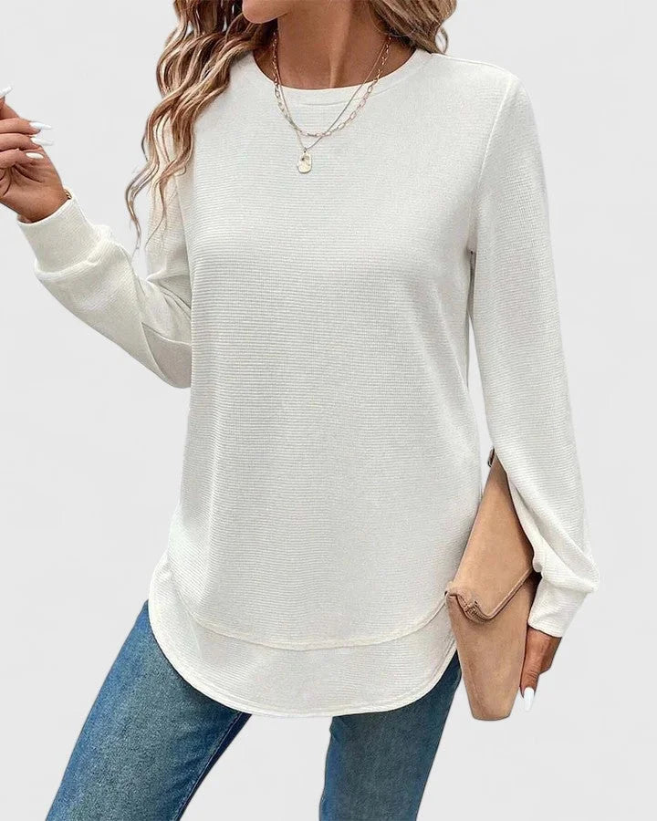 Women's knit crew neck sweater with curved hem
