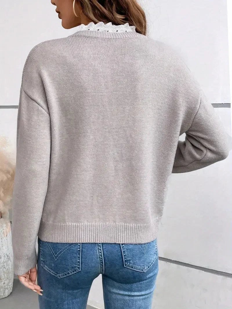 Women's knit v-neck sweater with ruffled trim