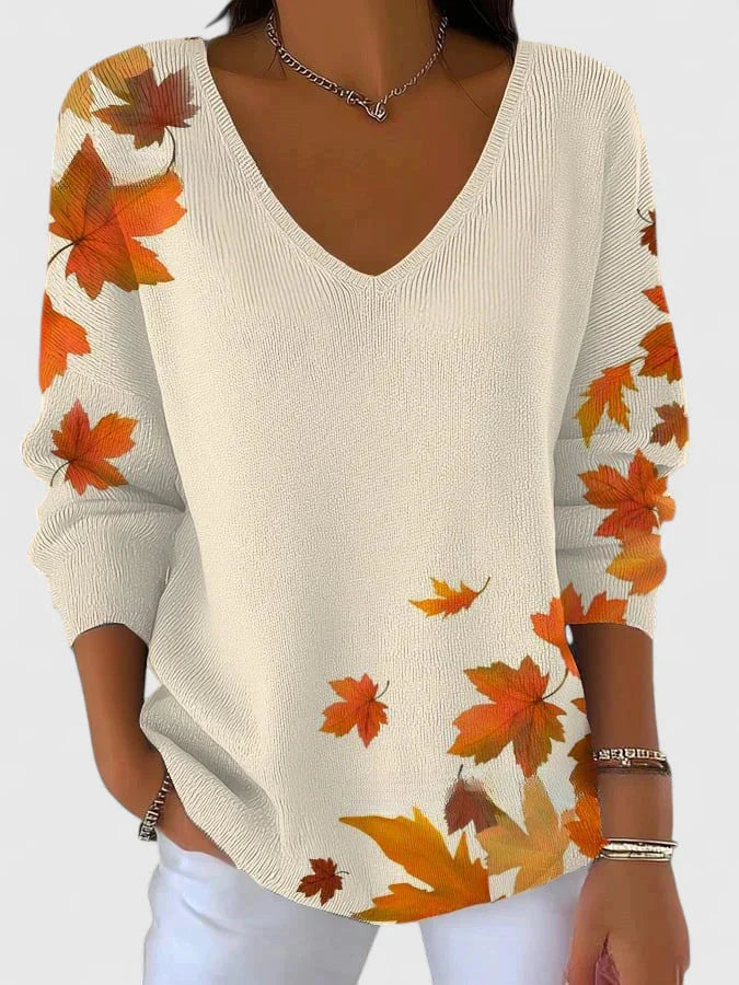 Women's knit v-neck sweater with autumn leaf print