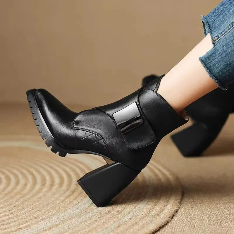 Women's faux leather ankle boots with metallic buckle detail