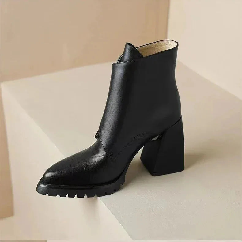 Women's faux leather ankle boots with metallic buckle detail