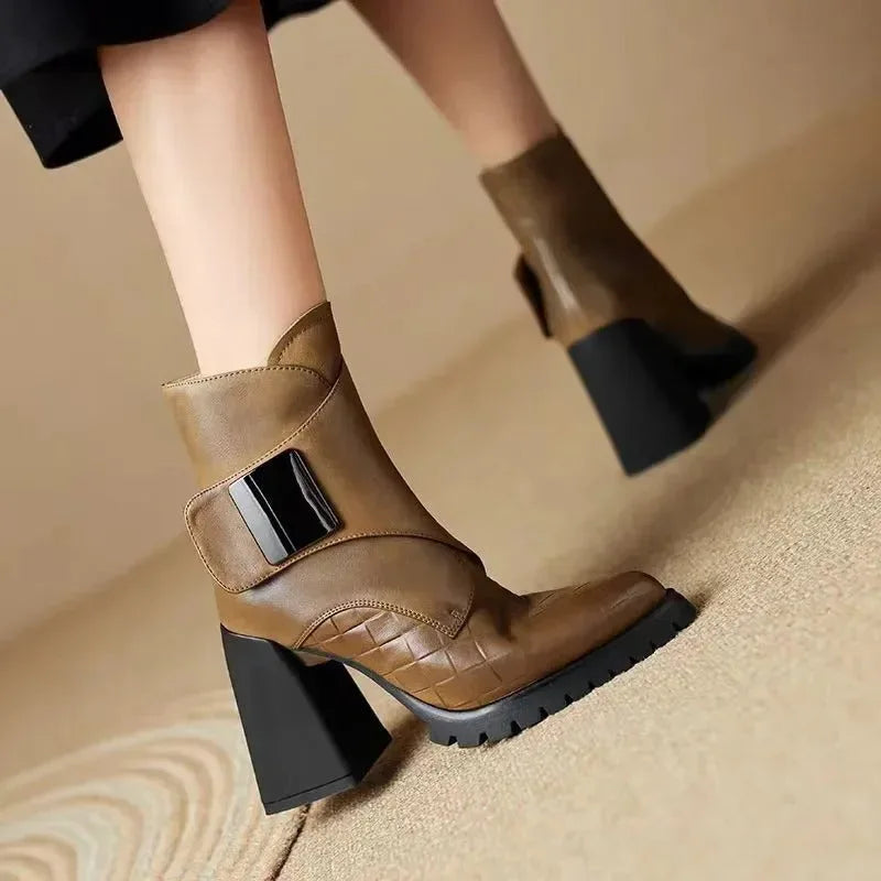Women's faux leather ankle boots with metallic buckle detail