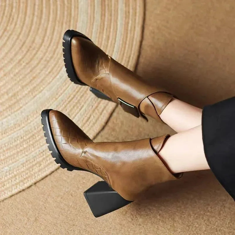 Women's faux leather ankle boots with metallic buckle detail