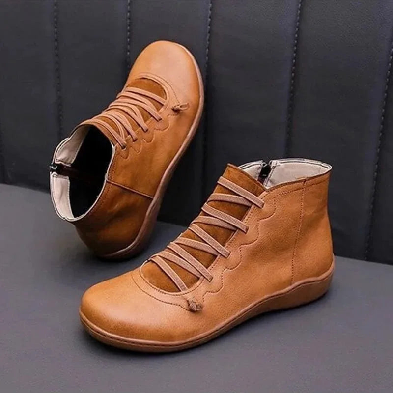 Women's faux leather lace-up ankle boots with side zip and flat wedge sole