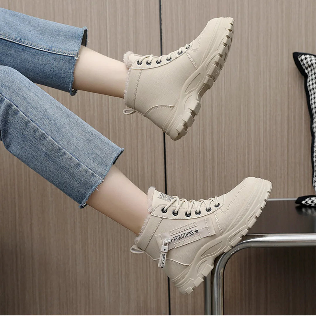Women's faux leather lace-up combat boots with fur lining