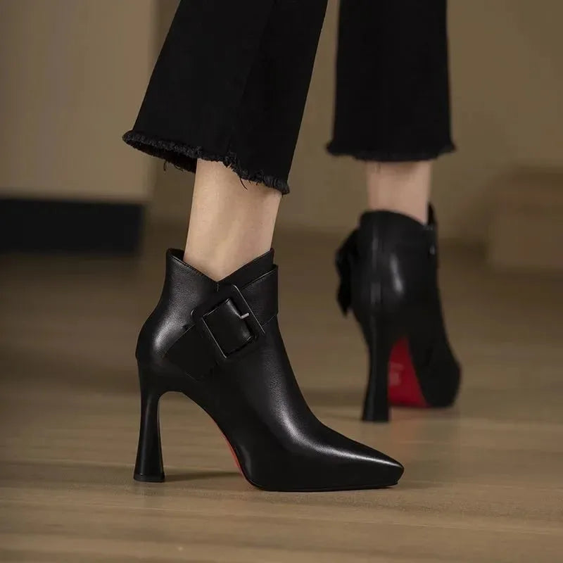 Women's faux leather side zip ankle boots with large buckle