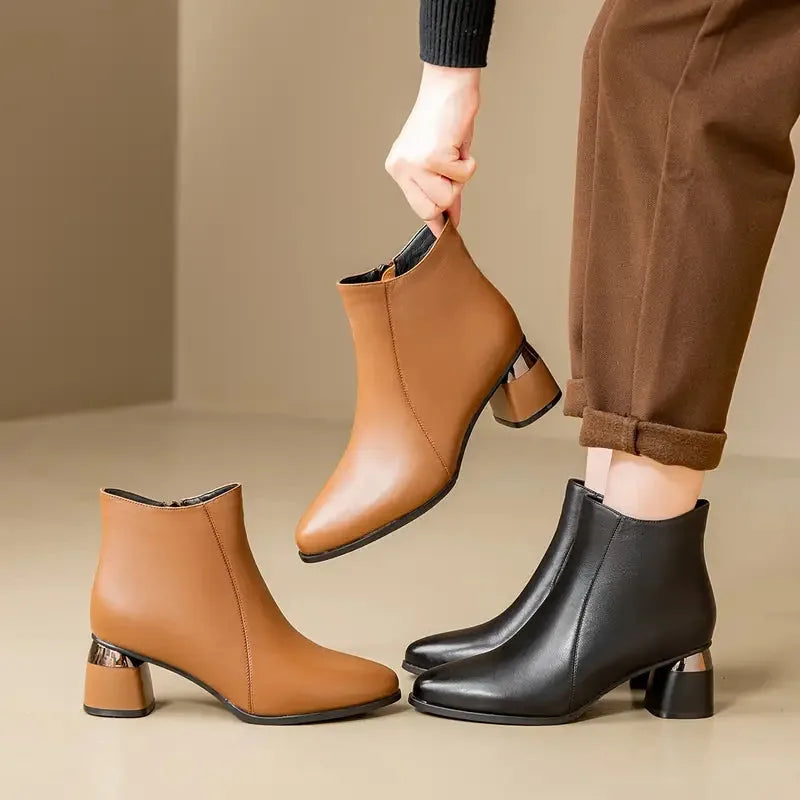 Women's faux leather side zip ankle boots with pointed toe and metallic heel