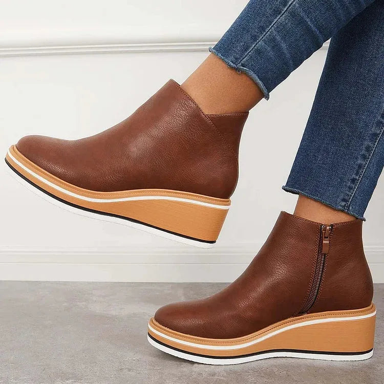 Women's faux leather side zip ankle boots with wedge platform sole
