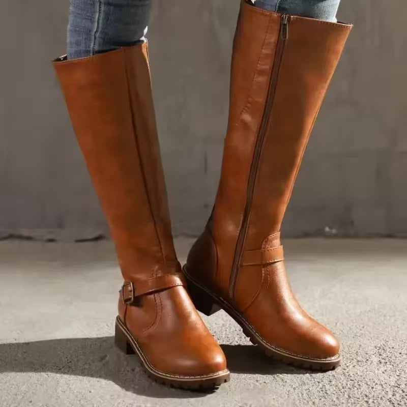 Women's faux leather side zip knee high boots with buckle strap and block heel