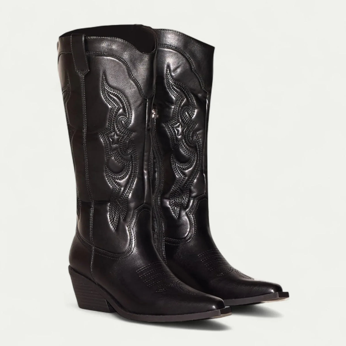 Women's faux leather side zip knee high boots with embroidered shaft