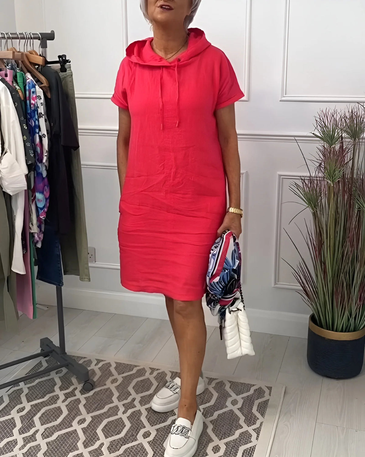 Women's hooded mini dress with side pockets