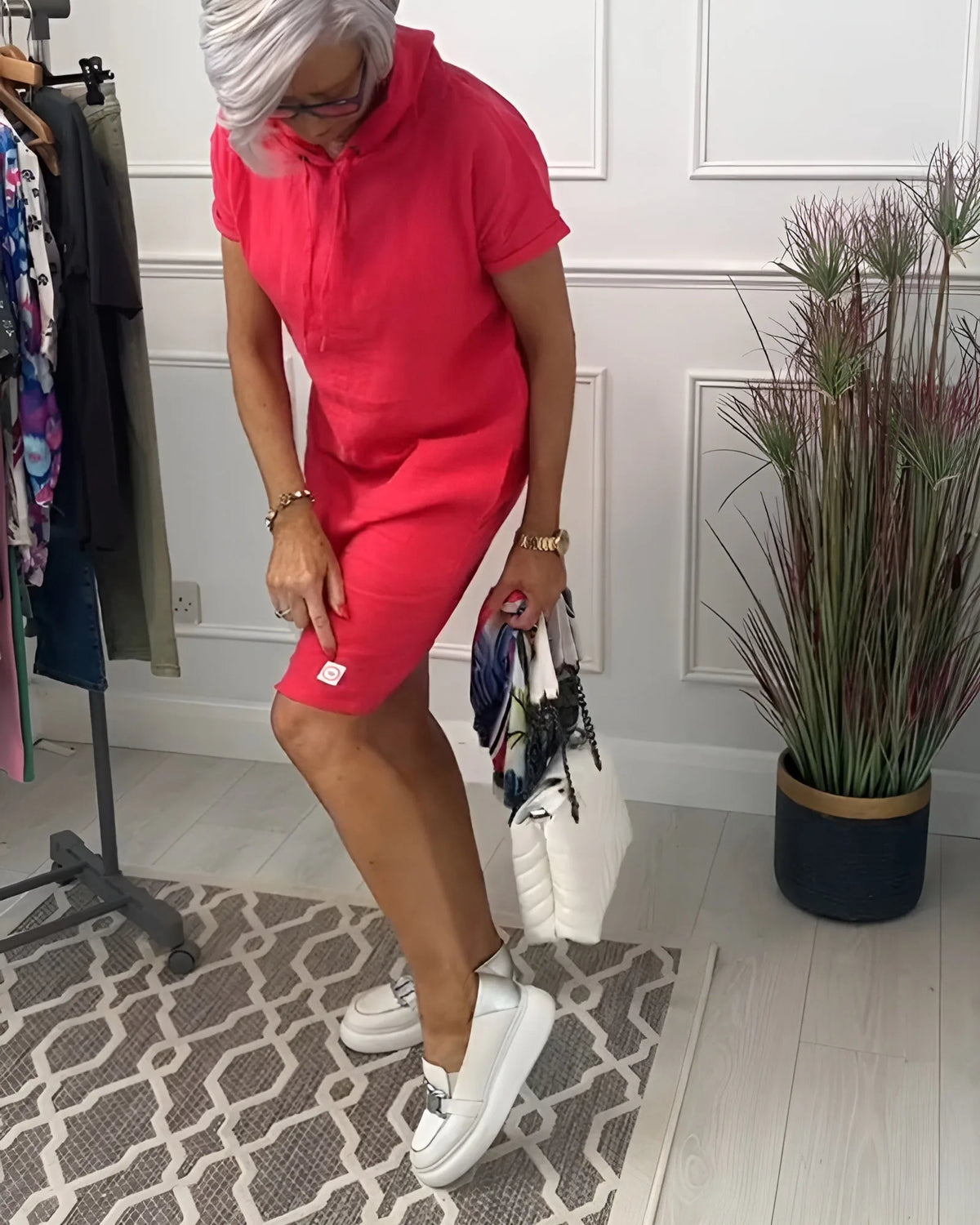 Women's hooded mini dress with side pockets