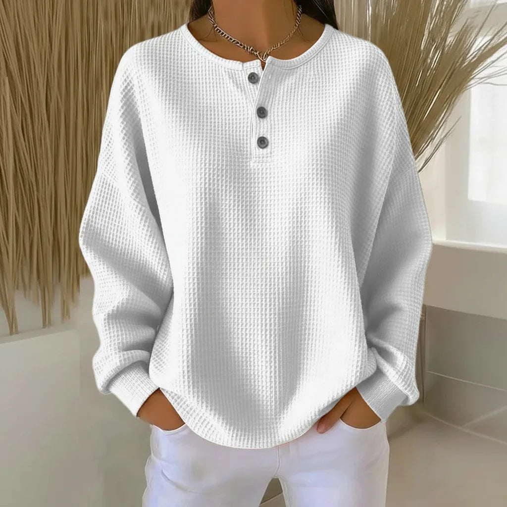 Women's knit crew neck sweater with button placket
