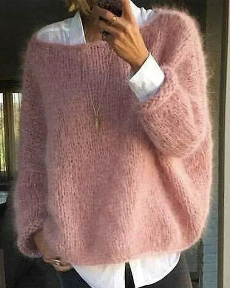 Women's knit crew neck sweater with fuzzy texture