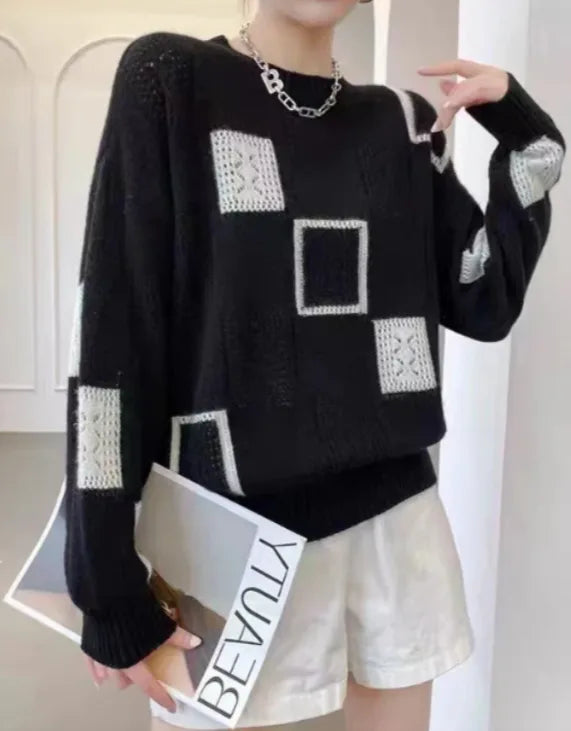 Women's knit crew neck sweater with textured square pattern