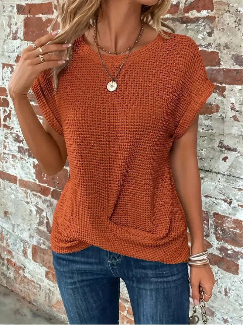Women's knit crew neck sweater with twisted front hem