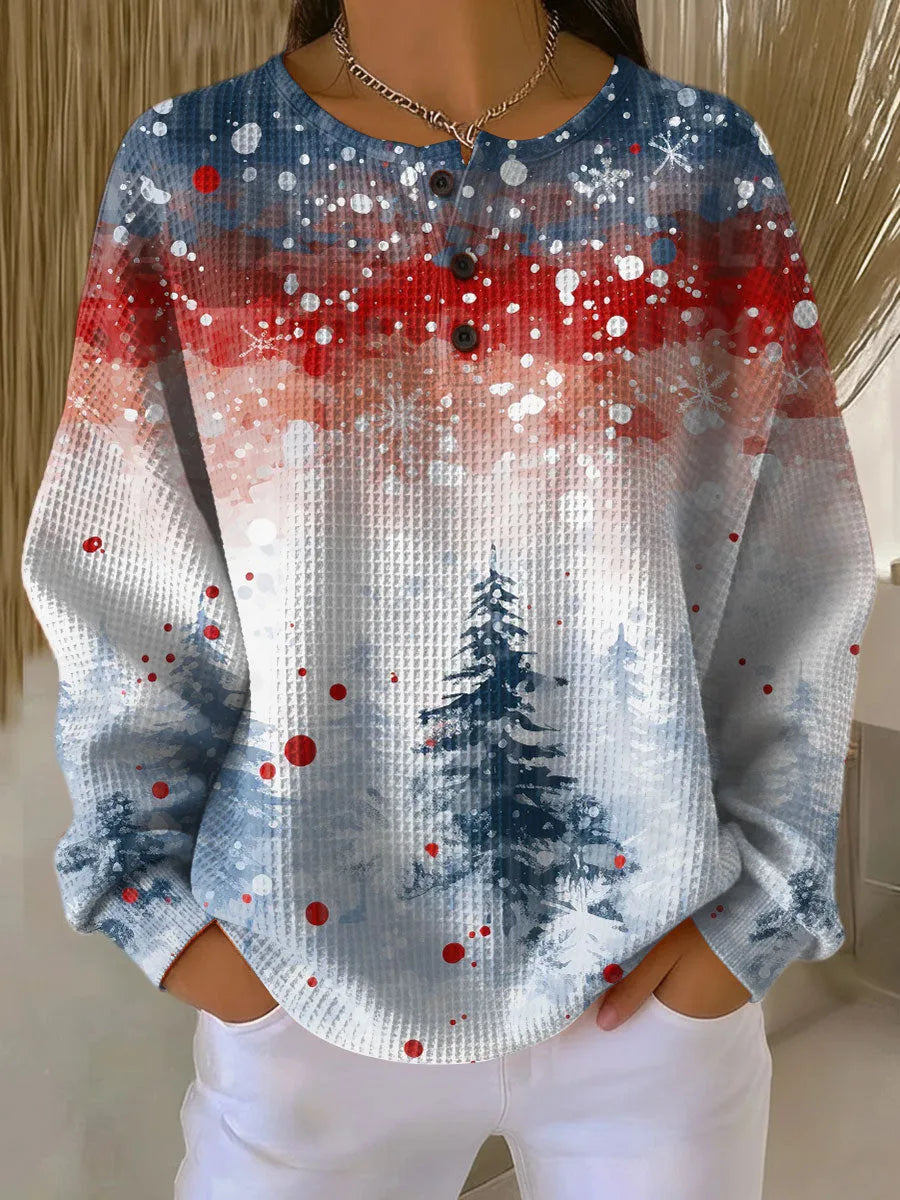 Women's knit crew neck sweater with winter scene