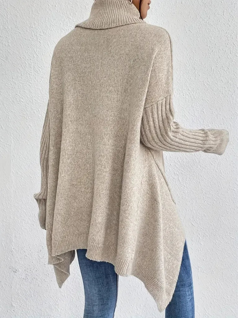 Women's knit roll neck sweater with asymmetrical hem