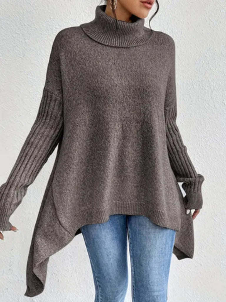 Women's knit roll neck sweater with asymmetrical hem