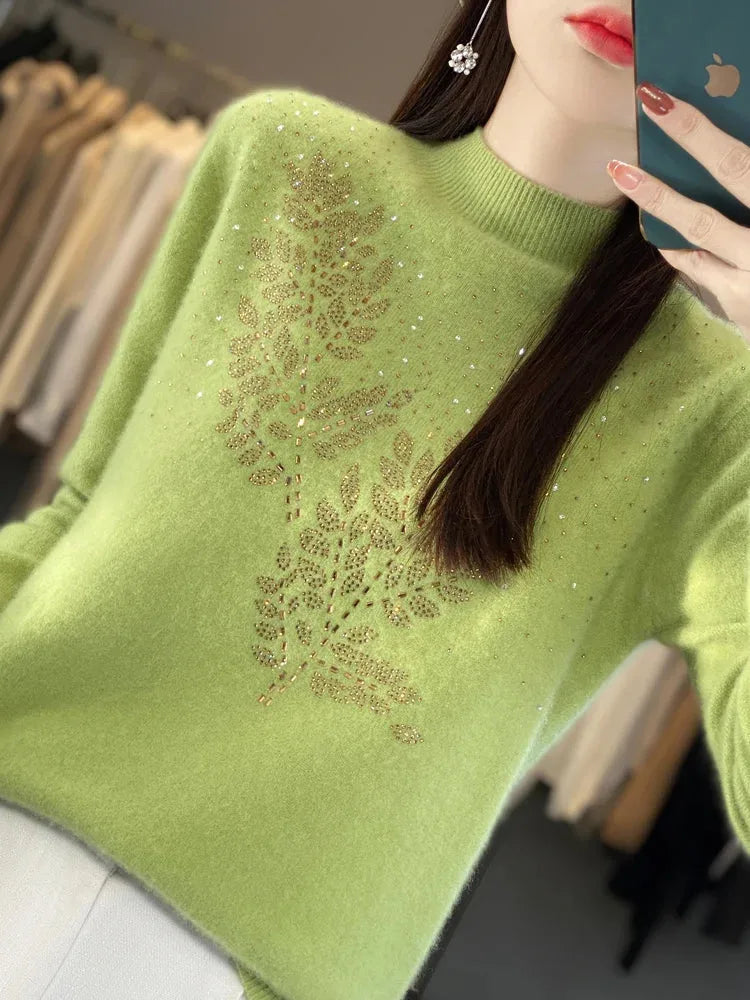 Women's knit stand collar sweater with rhinestone leaf embellishment