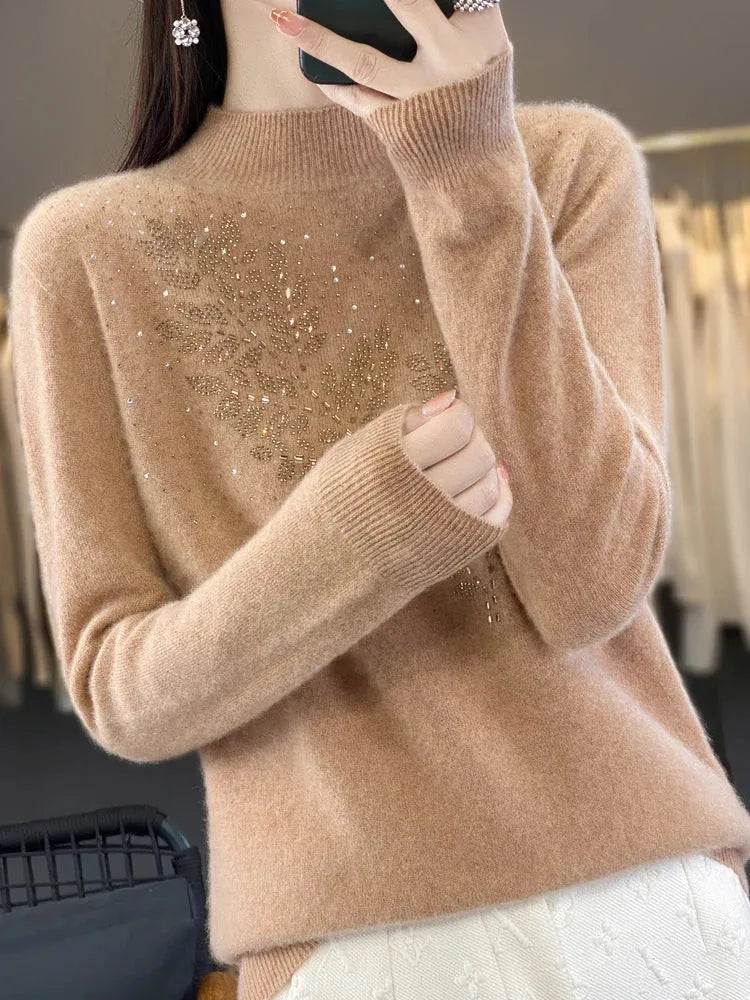 Women's knit stand collar sweater with rhinestone leaf embellishment