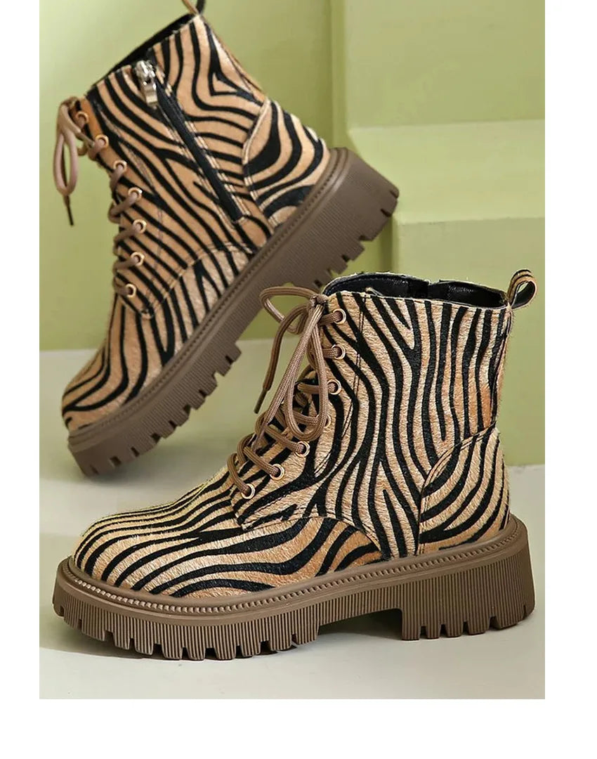 Women's lace-up combat boots with zebra print