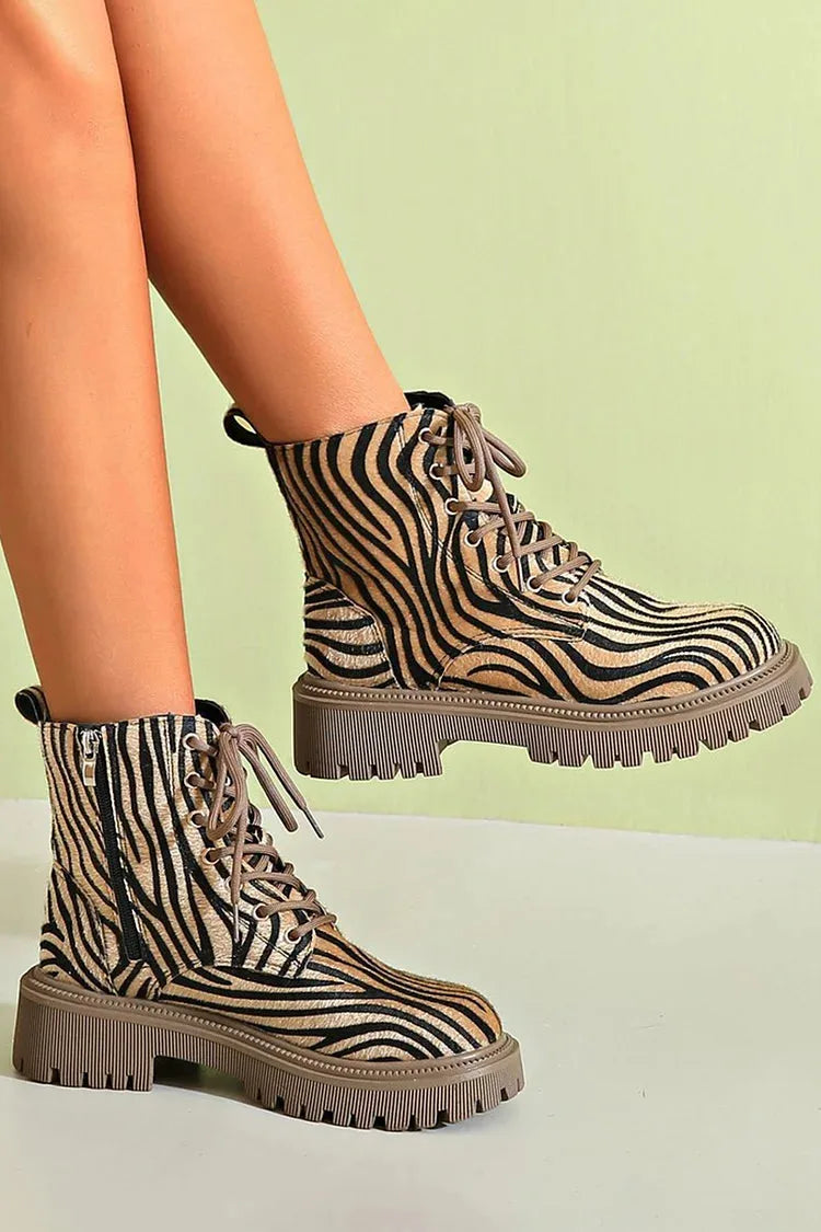 Women's lace-up combat boots with zebra print