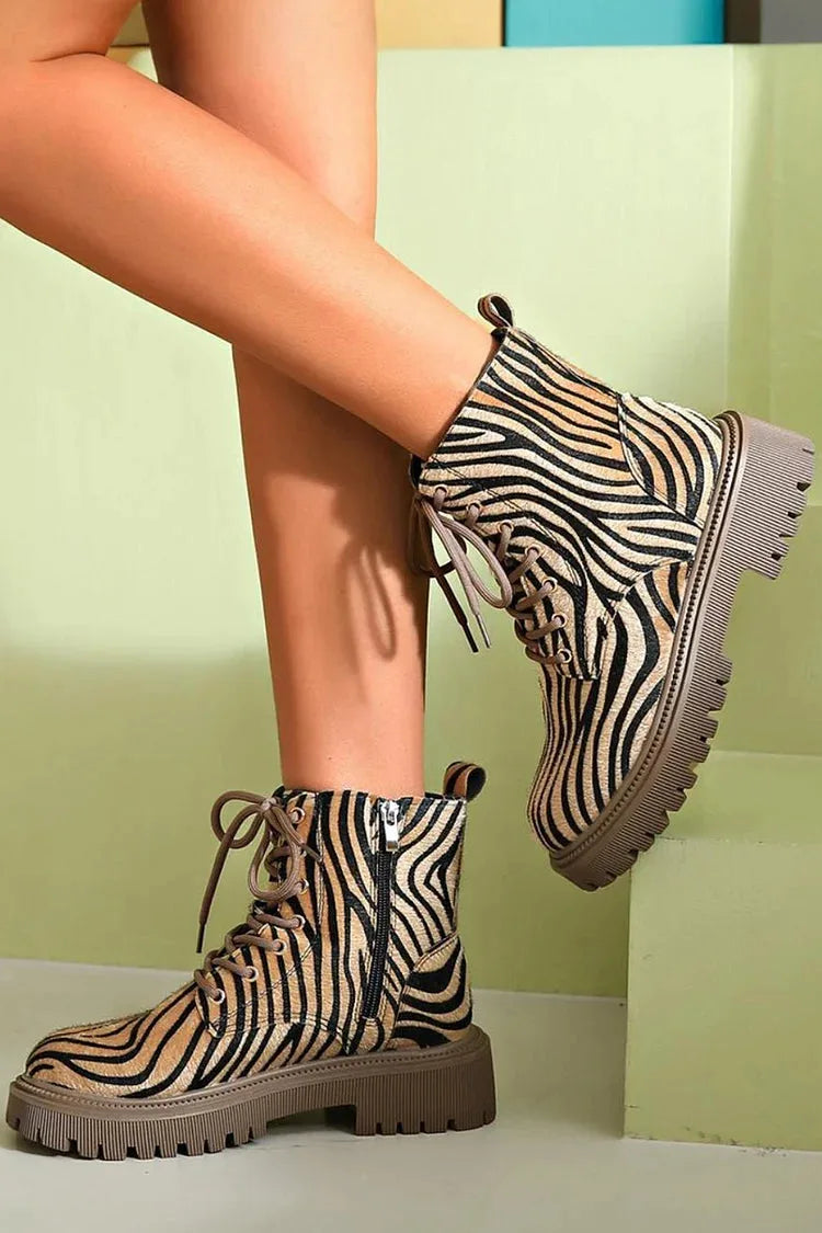 Women's lace-up combat boots with zebra print