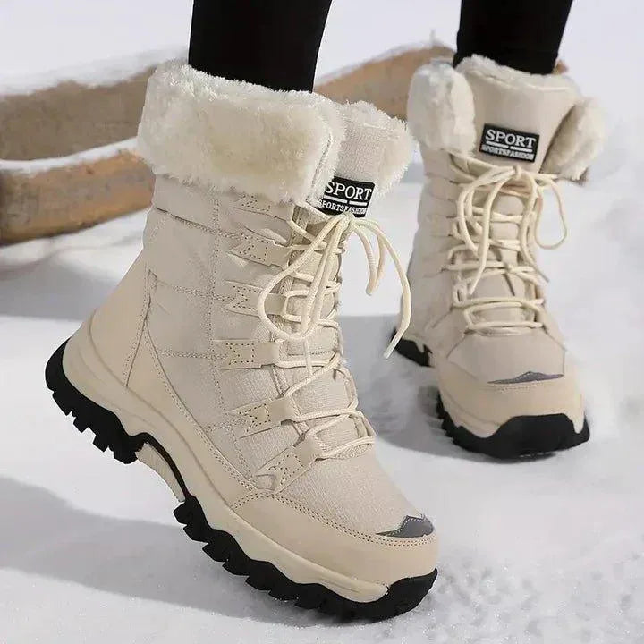 Women's quilted lace-up waterproof combat boots with faux fur trim