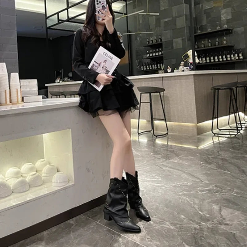 Women's studded faux leather side zip ankle boots
