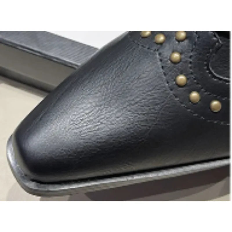Women's studded faux leather side zip ankle boots