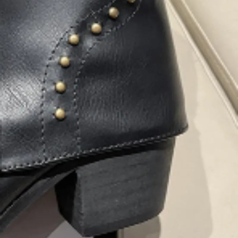 Women's studded faux leather side zip ankle boots