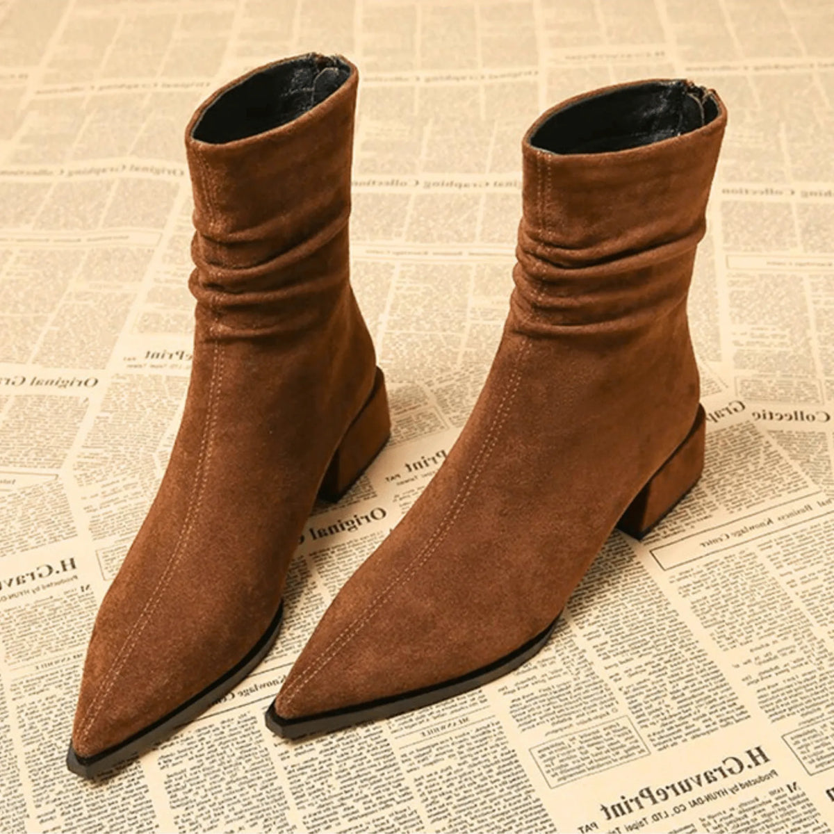 Women's suede side zip ankle boots with pointed toe and ruched shaft