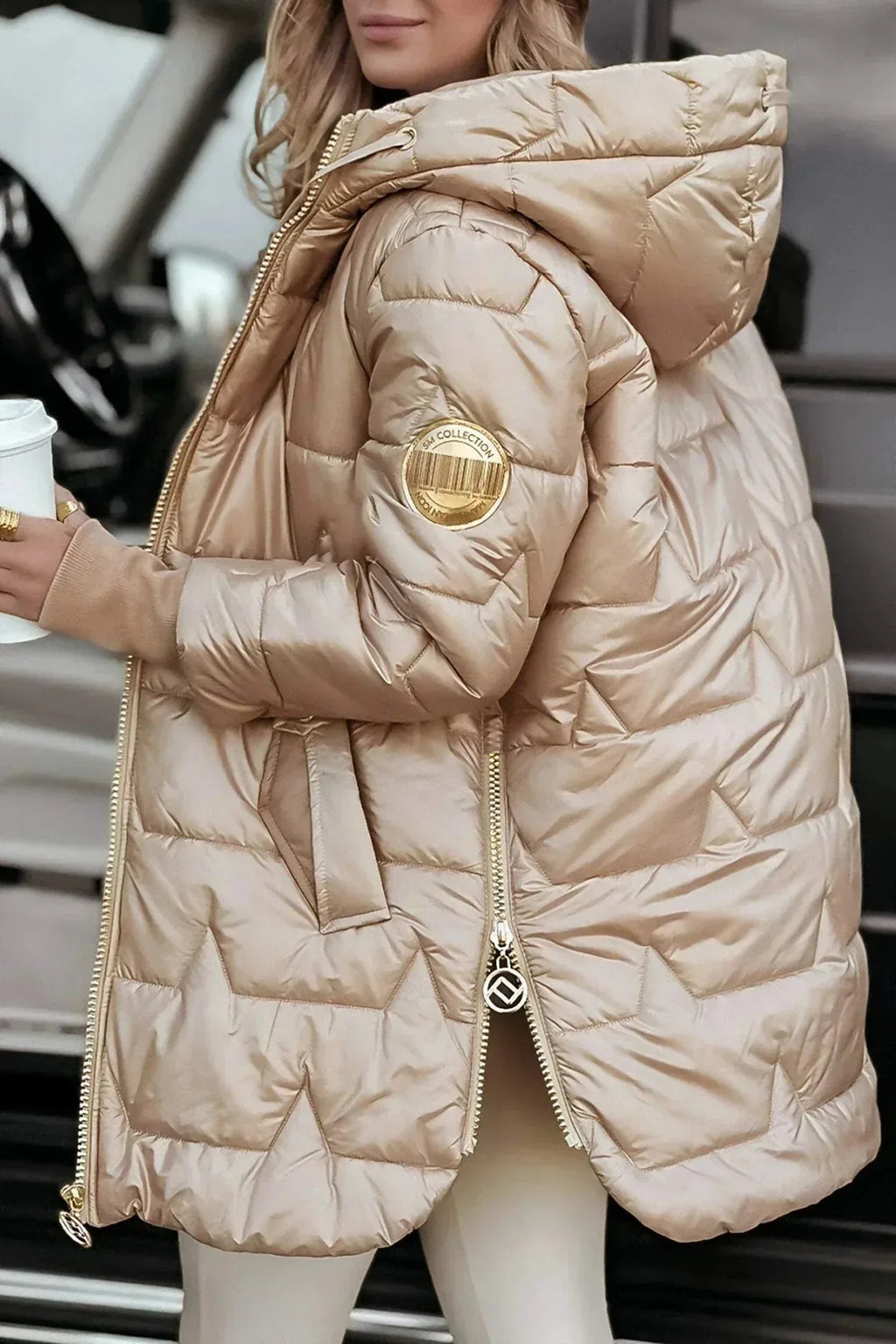 Women's zip-up hooded quilted coat with ribbed cuffs