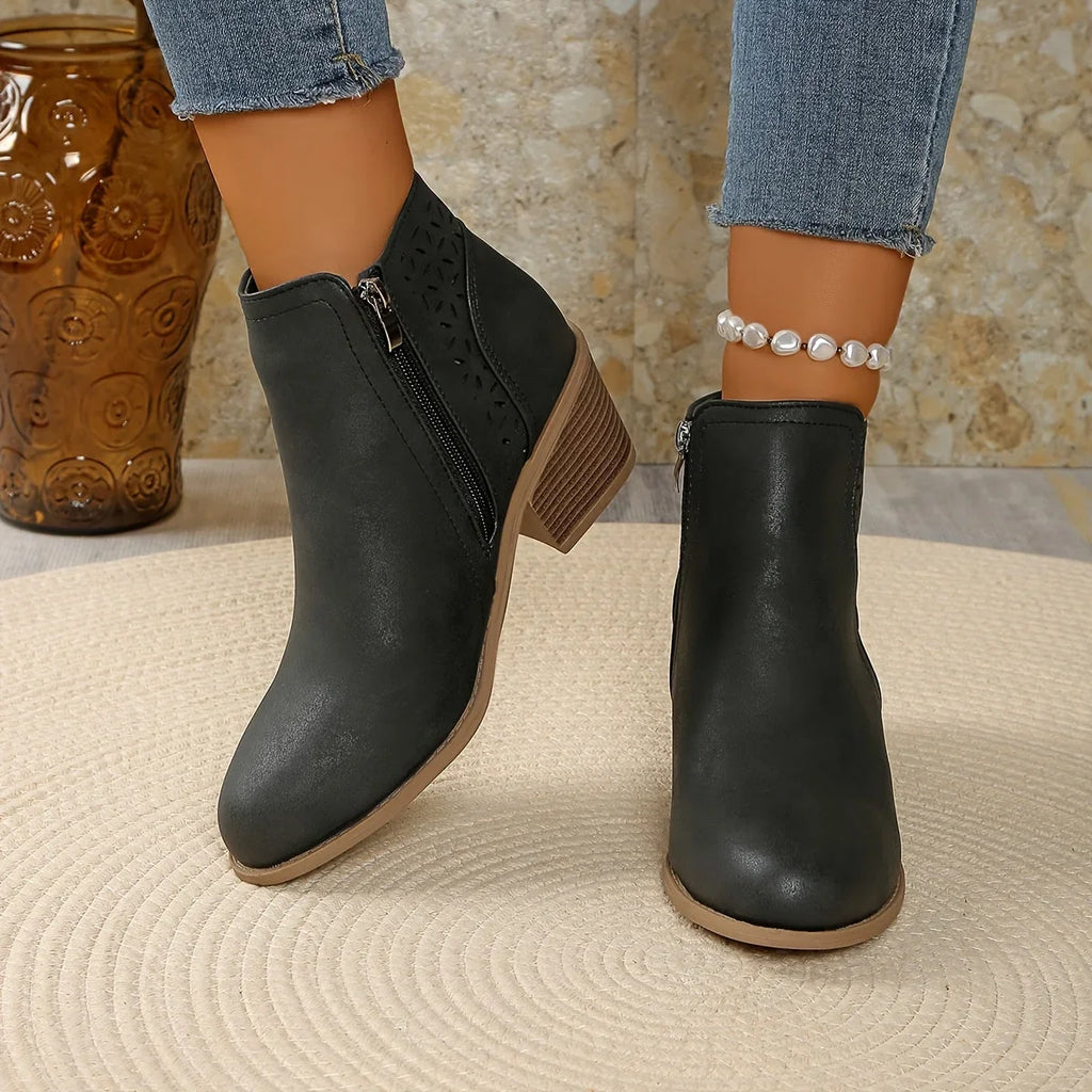 Women's faux leather side zip orthopedic ankle boots with laser-cut perforations