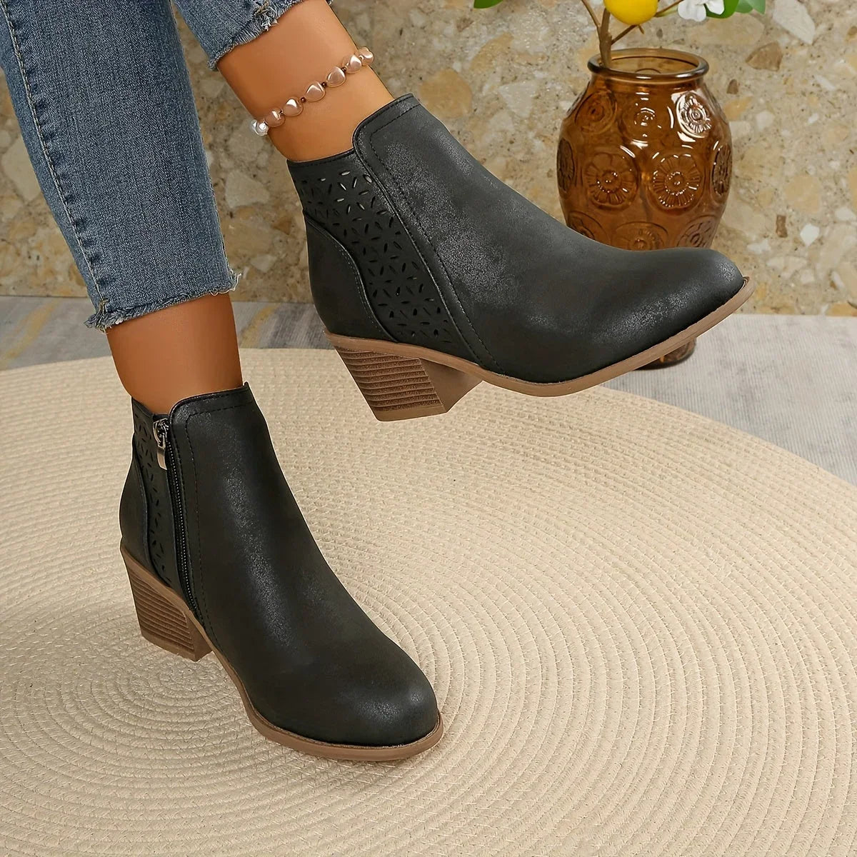 Women's faux leather side zip orthopedic ankle boots with laser-cut perforations