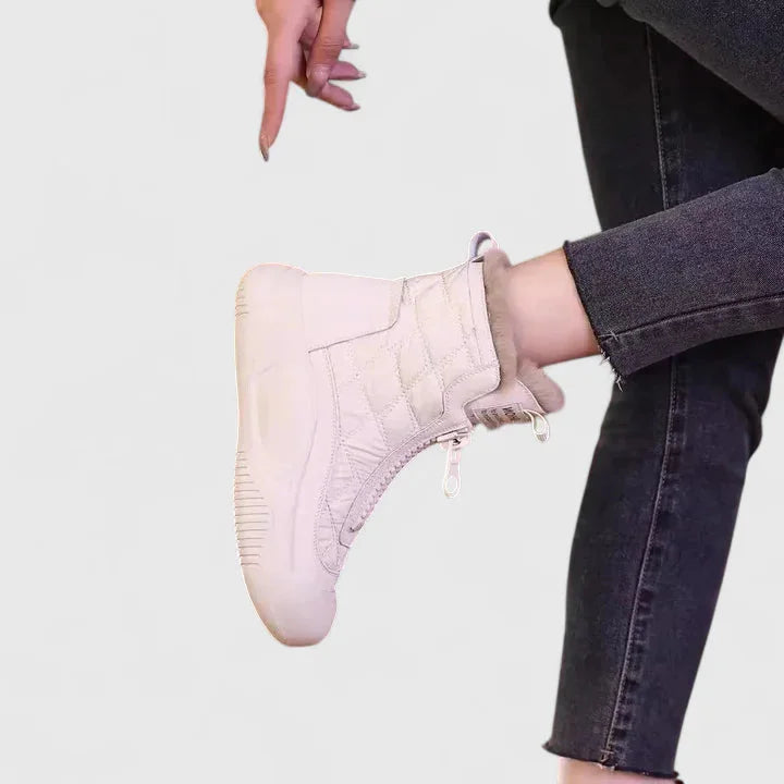 Women's quilted zip-up orthopedic ankle boots with faux fur lining