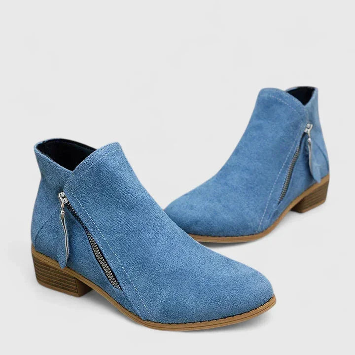 Women's suede side zip ankle boots with decorative stitching