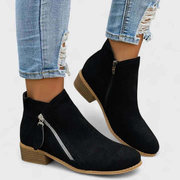 Women's suede side zip ankle boots with decorative stitching