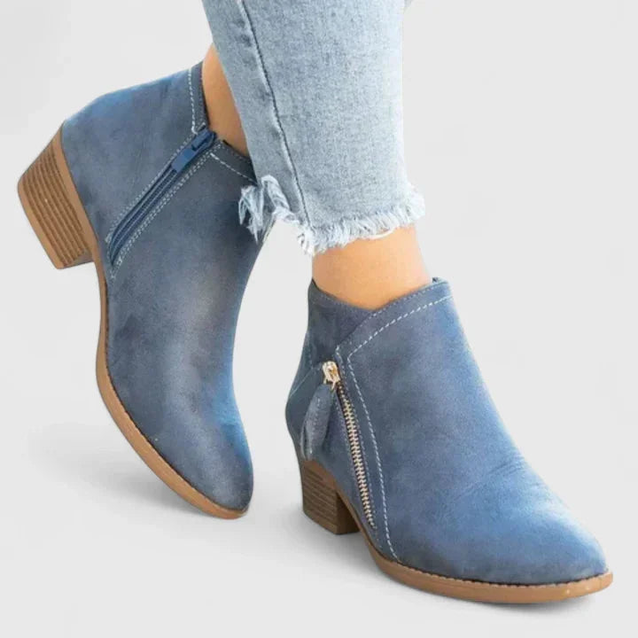Women's suede side zip ankle boots with decorative stitching