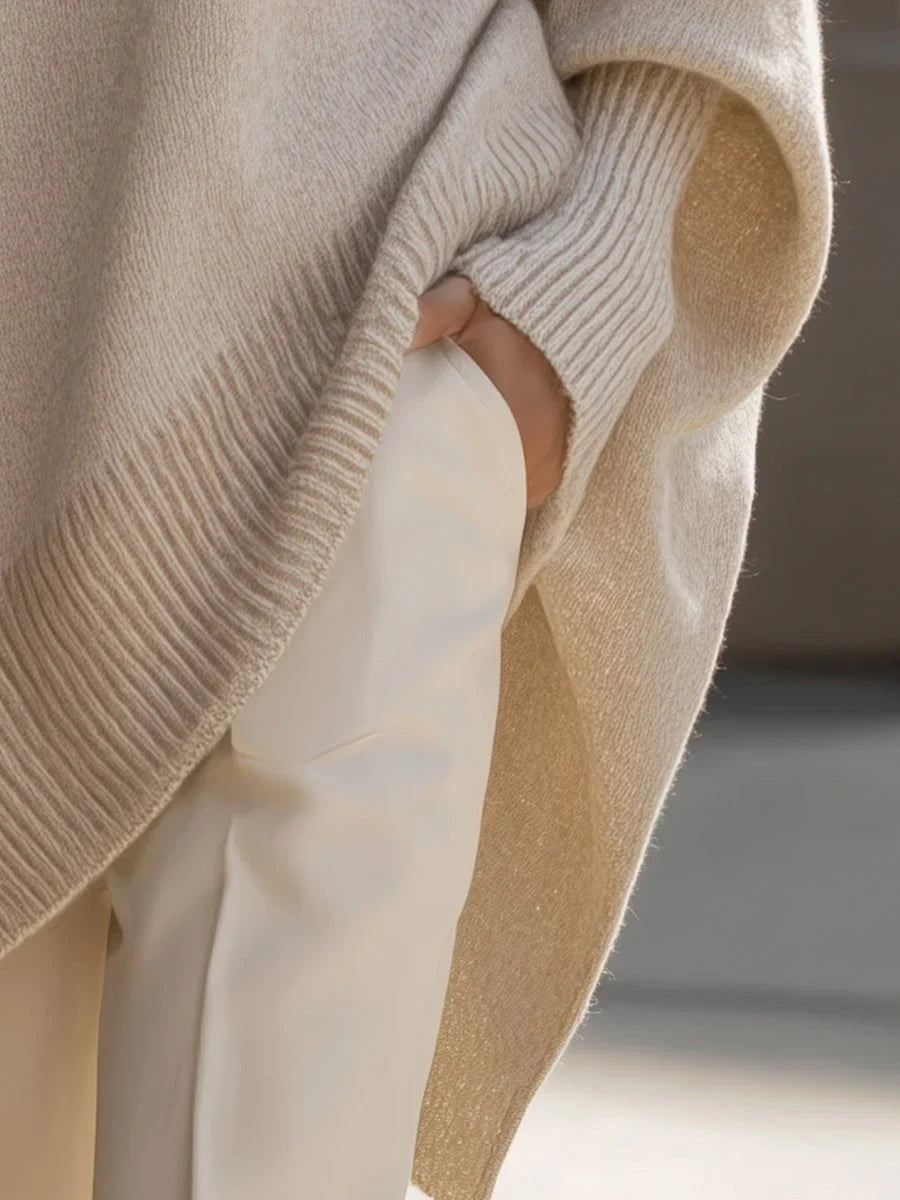 Women's knit crew neck sweater with asymmetrical hem