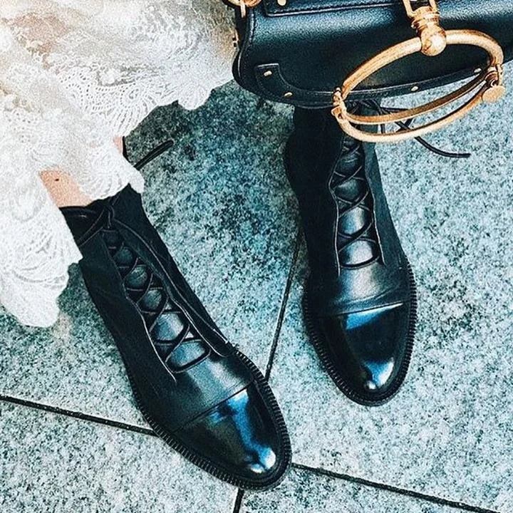 Women's faux leather lace-up knee high boots with two-tone toe cap