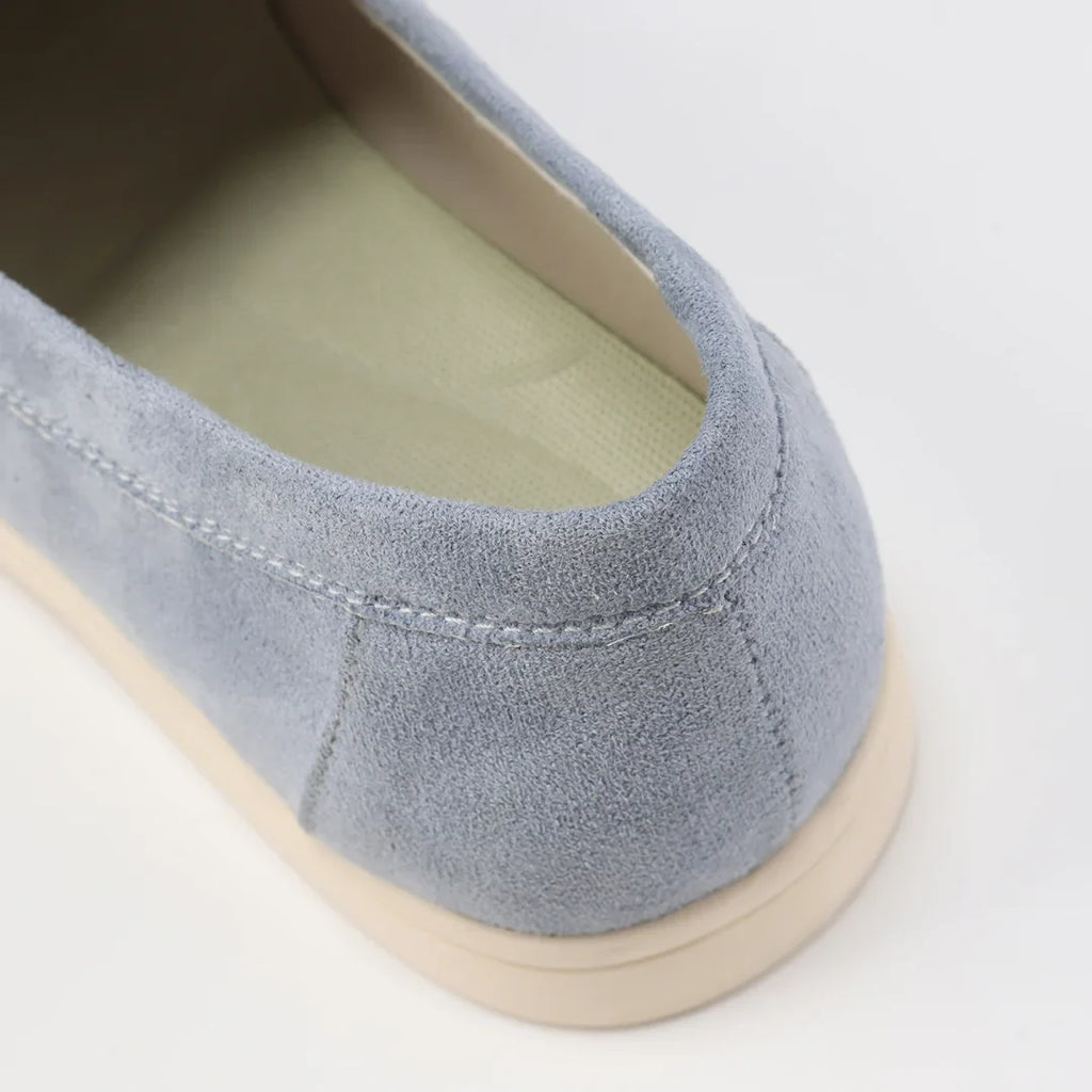 Women's suede loafers with moccasin toe stitching